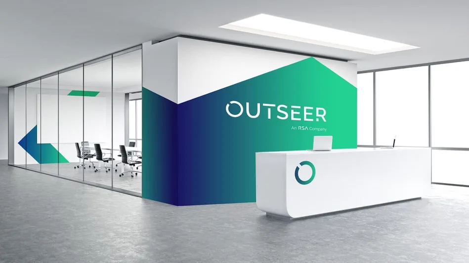 Outseer office lobby with branded reception wall in green and navy.