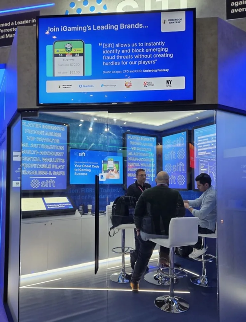Attendees seated inside the Fraud Command Center during a demonstration.